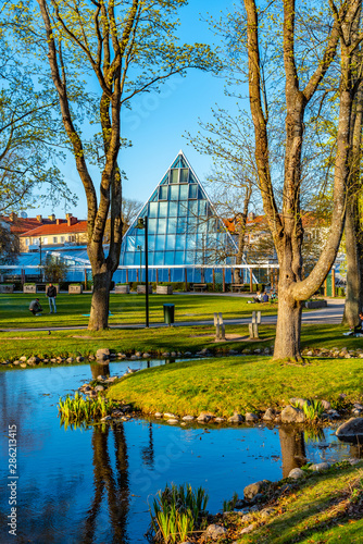 Obraz na plátně View of a park and a tropical restaurant in Linkoping in Sweden