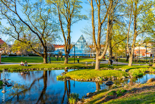 View of a park and a tropical restaurant in Linkoping in Sweden photo