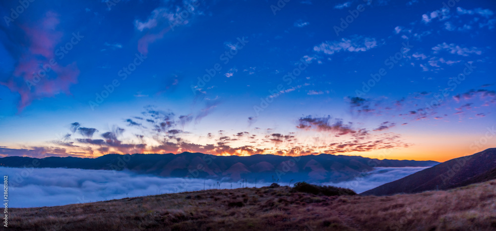 Panorama Sunrise in Mountains and Valleys