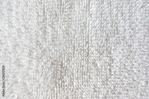 pubic hair on white towel