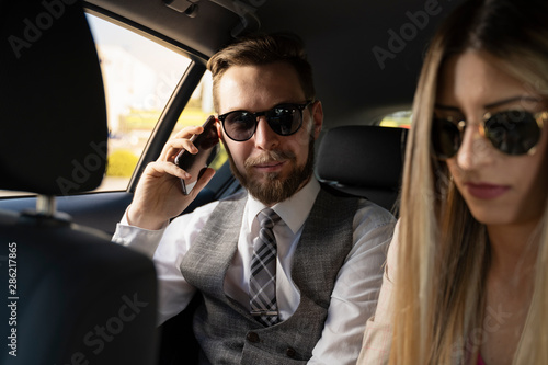 Businessman talking in the car on smartphone  © phoenix021