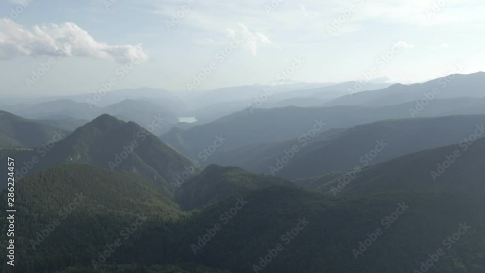 A slow motion shot with a great mountain in Romania under the sunshine A slow motion shot with a great mountain in Romania under the sunshine