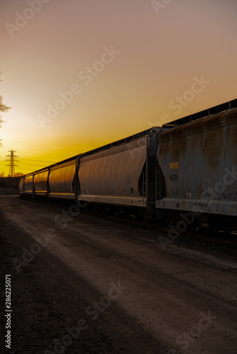 freight train yard at sunset