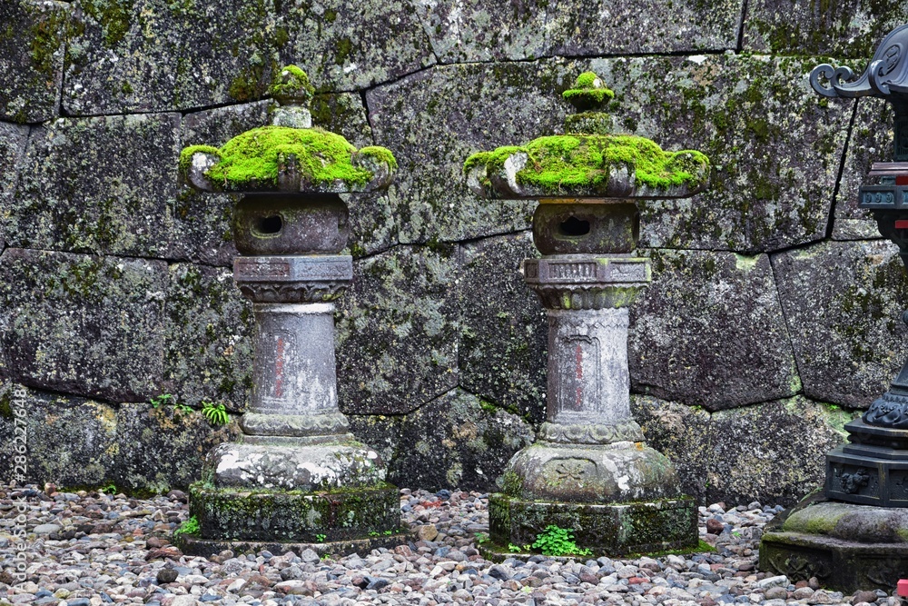 Traditional Japanese gardens in public parks in Tokyo, Japan. Views of stone lanterns, lakes, ponds, bonsai and wildlife walking around paths and trails. Asia. Traditional Japanese gardens in public parks in Tokyo, Japan. Views of stone lanterns, lakes, ponds, bonsai and wildlife walking around paths and trails. Asia.