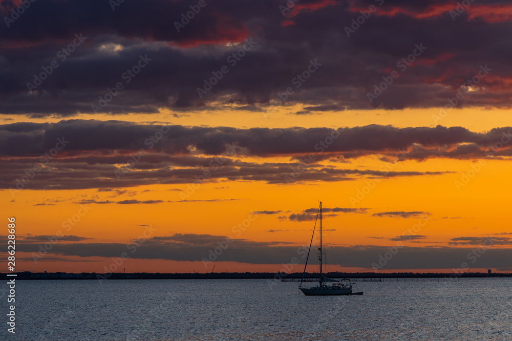 Sailboat at Sunset on the Bay