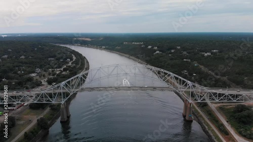 Aerial shots of the Sagamore bridge leading to Cape Cod with traffic in the summer in 2019. Shot in 4K with the DJI Mavic Air. photo