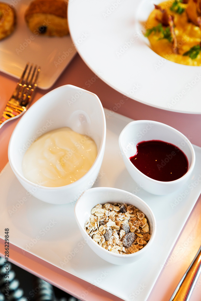 Healthy breakfast - yogurt with muesli and berries