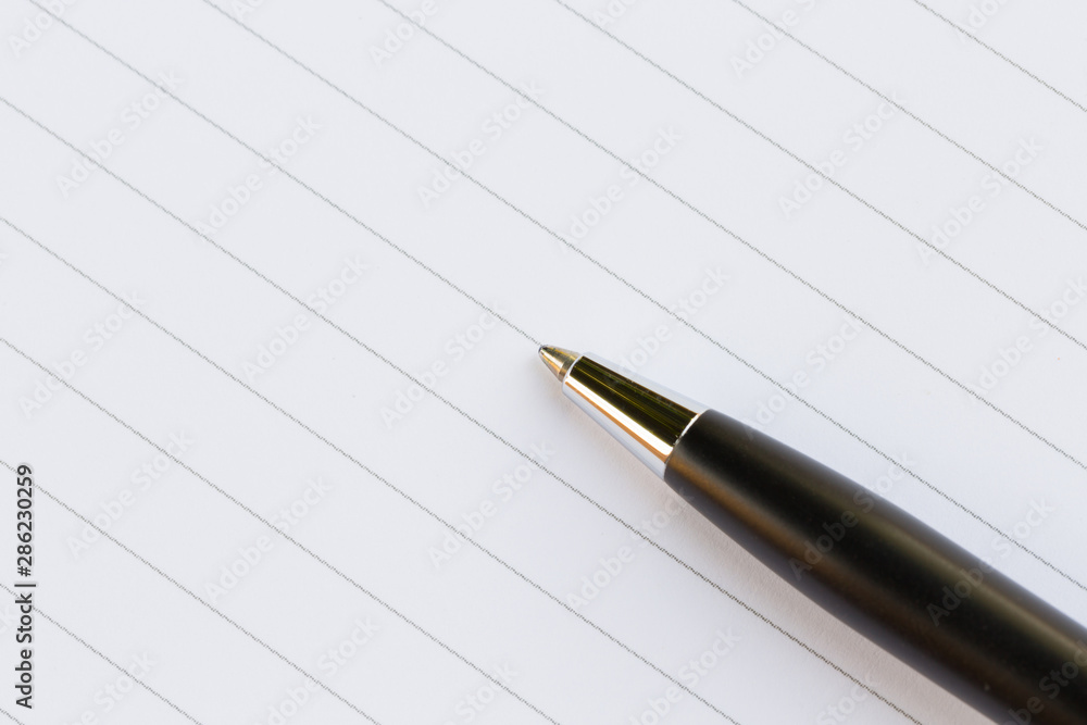 Close up of pen and notebook, Business Background Close up of pen and notebook, Business Background