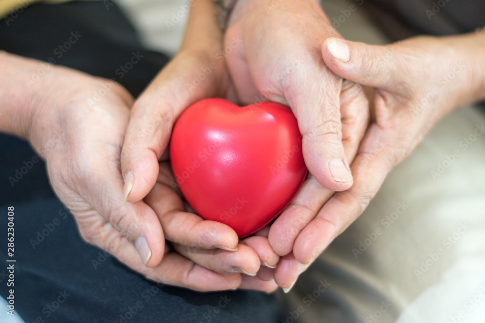 Old couple people hand holding heart shape together as express happy love life wellbeing. Old couple people hand holding heart shape together as express happy love life wellbeing.