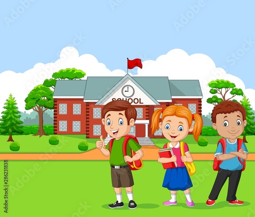 Happy school children in front of the school