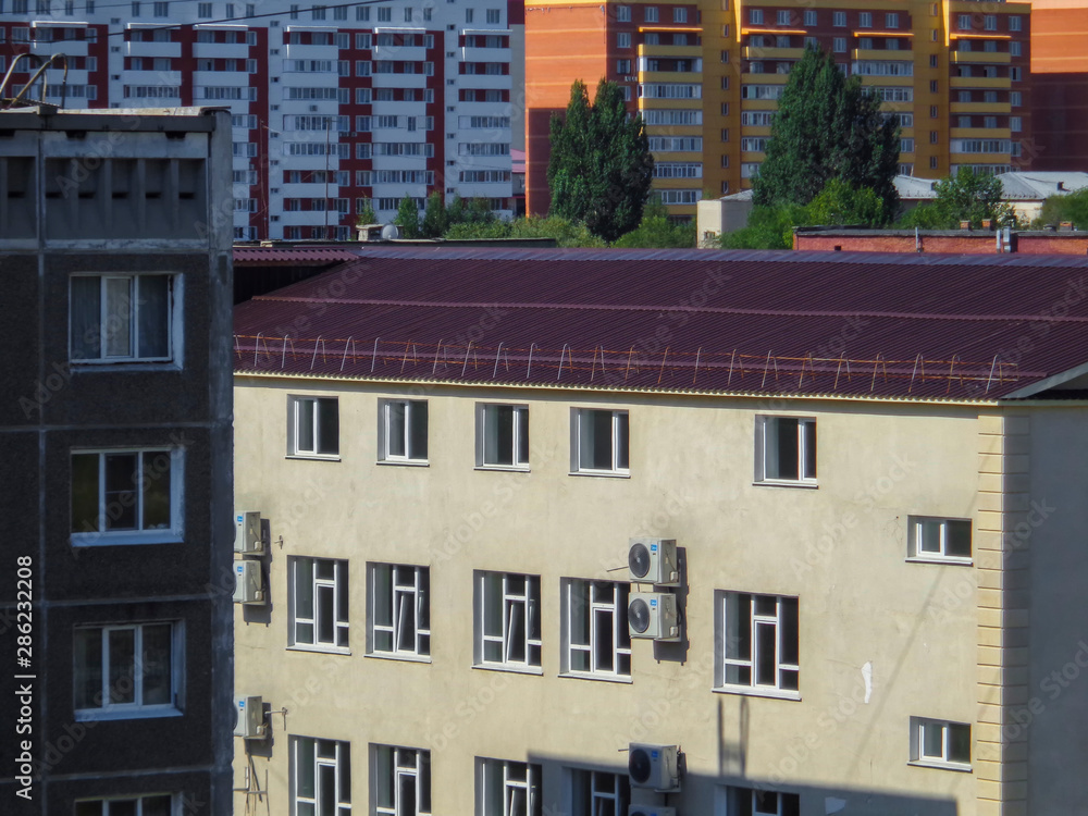 Different buildings background. Old and New. Ust-Kamenogorsk (Kazakhstan). Abstract urban background. Cityscape