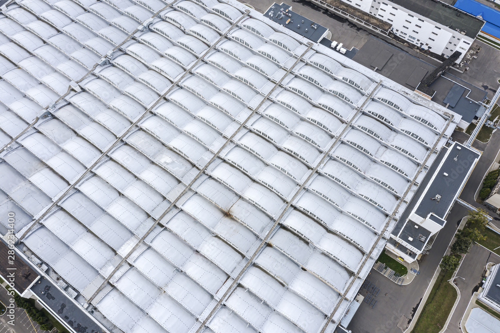 birds eye view of factory building in city industrial area birds eye view of factory building in city industrial area