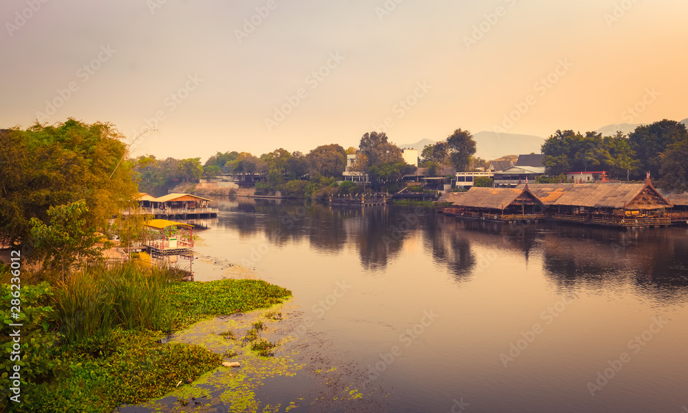 Fototapeta premium Sunrise over the river Kwai, Kanchanaburi, Thailand. Panorama