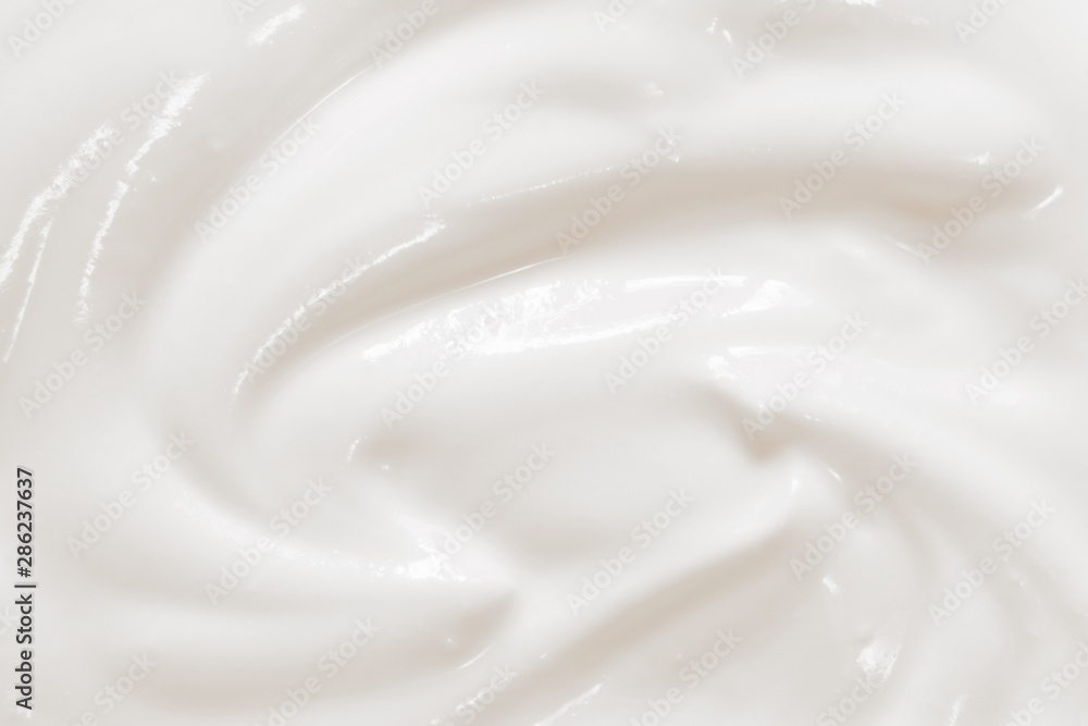 Sour cream, creamy yogurt texture. White dairy food background Sour cream, creamy yogurt texture. White dairy food background