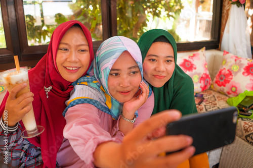 Photography Muslim teenager student girlfriends selfie - pretty Asian Indonesian girls in tr