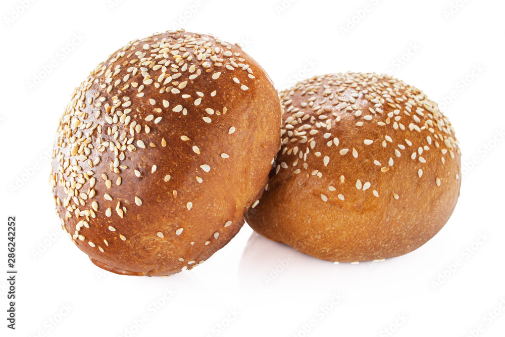 Homemade sourdough bread. Burger bun isolated on white background Homemade sourdough bread. Burger bun isolated on white background