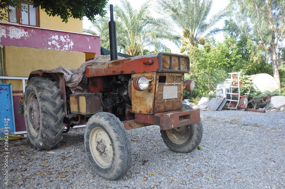 An old tractor used for cultivating land in hot countries. An old tractor used for cultivating land in hot countries.