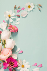 summer flowers on green paper background