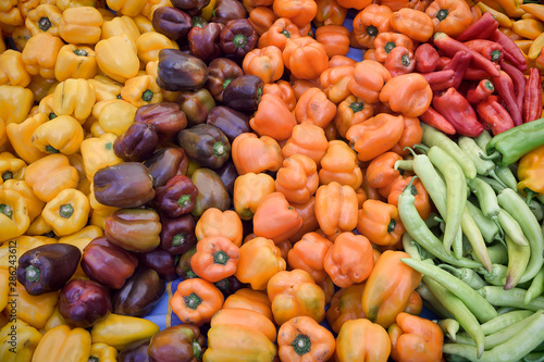Bell peppers of different colors in a market
