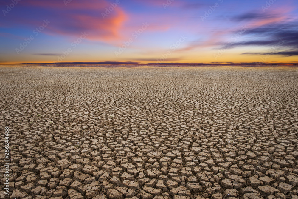 Climate drought, Terrain cracked soil in hot weather Climate drought, Terrain cracked soil in hot weather
