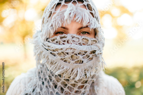 Arabian woman wrapped in yashmak closeup portrait. photo