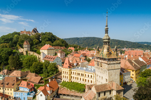 Fotografie Aerial drone view of Sighisoara old city and clock tower, Romania