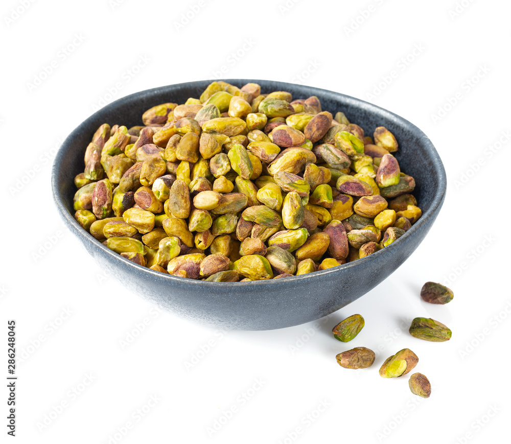 raw pistachio nuts isolated on white raw pistachio nuts isolated on white