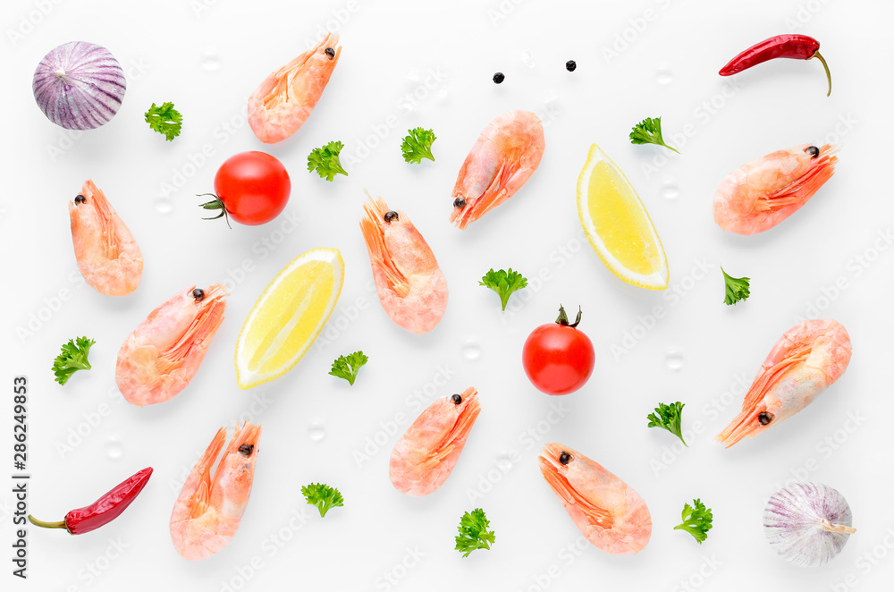 food background with cooked shrimps, chili, garlic and lemon on white background food background with cooked shrimps, chili, garlic and lemon on white background