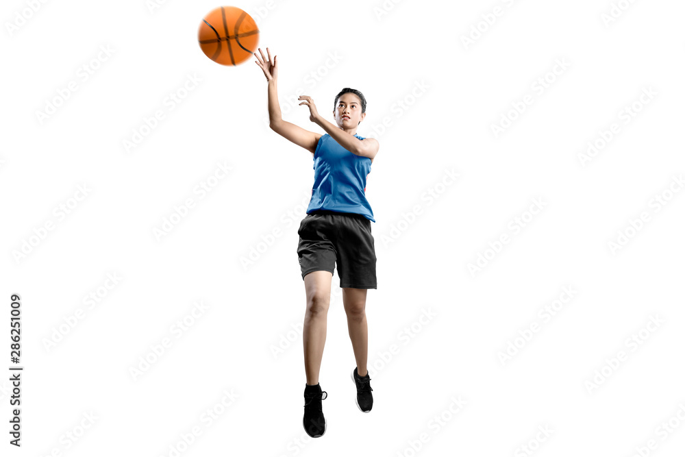 Asian woman basketball player in action with the ball