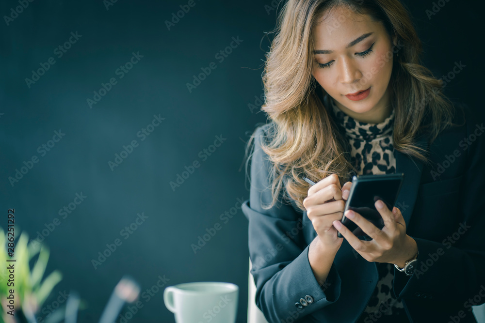 Portrait of beautiful smiling young entrepreneur businesswoman working in modern work station. Portrait of beautiful smiling young entrepreneur businesswoman working in modern work station.