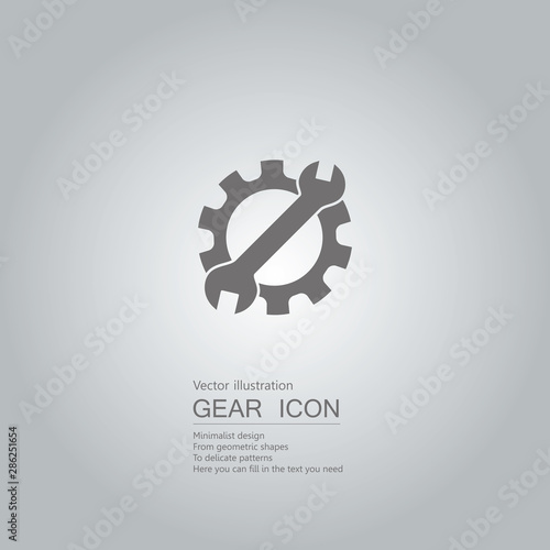 Gears and wrenches. The background is a gray gradient.
