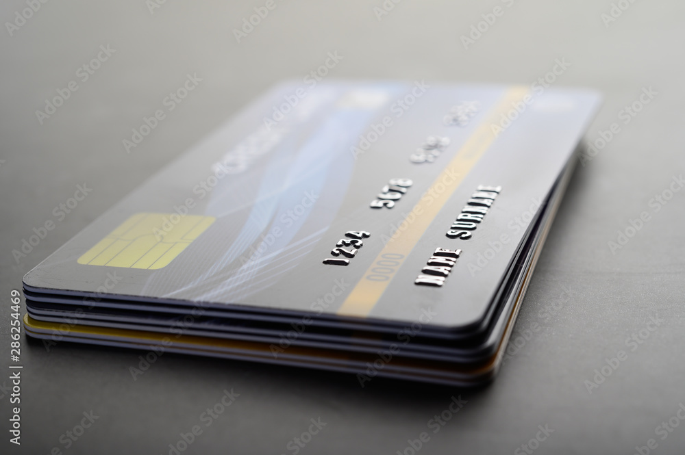 Credit cards that are stacked neatly together,selective focus Credit cards that are stacked neatly together,selective focus