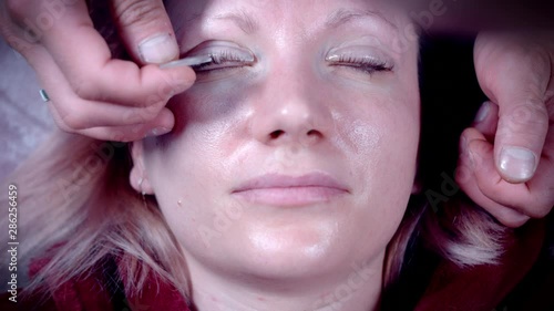 4k Close-up of Woman Face Having Eyelashes Lifting Treatment photo