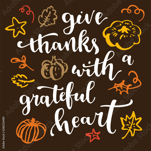 Give thanks with a grateful heart. Thanksgiving quote. Fall modern calligraphic hand drawn greeting card with pumpkin and leaves. Autumn colored artwork, print, artistic vector illustration