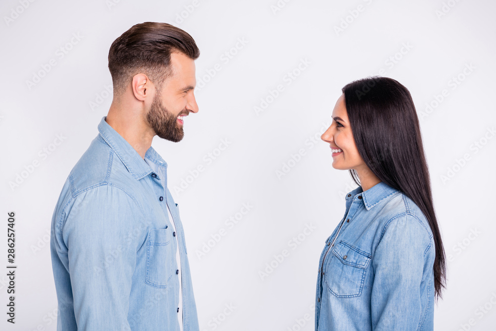 Profile side view portrait of his he her she nice attractive lovely lovable charming cute cheerful cheery persons first date meet connection communicate isolated over light white pastel background Profile side view portrait of his he her she nice attractive lovely lovable charming cute cheerful cheery persons first date meet connection communicate isolated over light white pastel background
