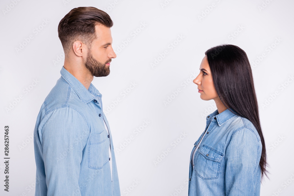 Profile side view portrait of his he her she nice-looking attractive lovely charming cute content persons looking at each other first date meeting isolated over light white pastel background Profile side view portrait of his he her she nice-looking attractive lovely charming cute content persons looking at each other first date meeting isolated over light white pastel background
