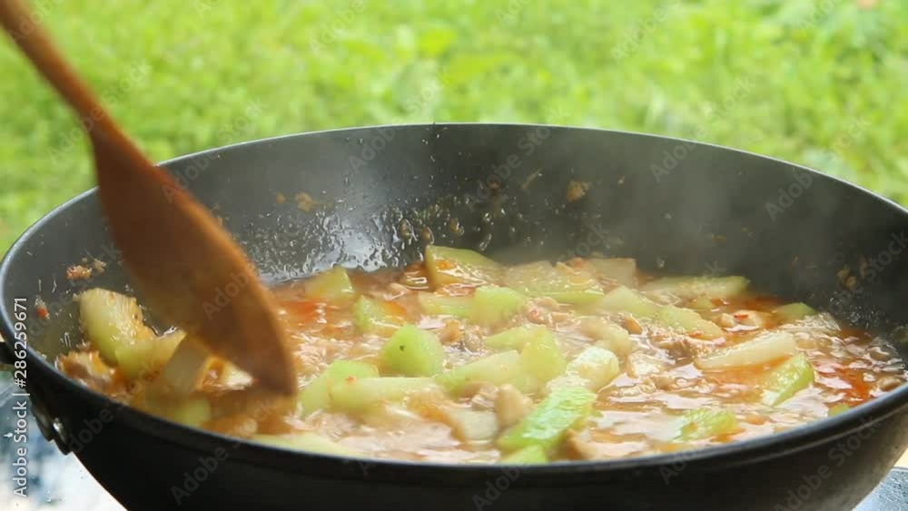 Cooking winter melon curry with chicken, Thai northern food