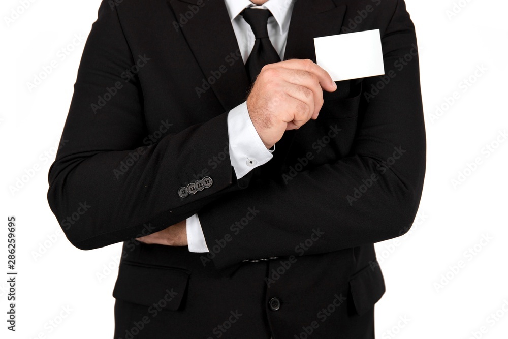 businessman in formal wear holding blank business card -- Standing in front of a white background. businessman in formal wear holding blank business card -- Standing in front of a white background.