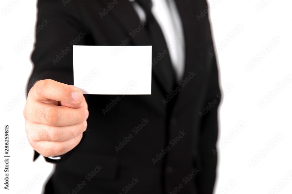 businessman with holding up his blank white business card to show his credentials and qualification. businessman with holding up his blank white business card to show his credentials and qualification.