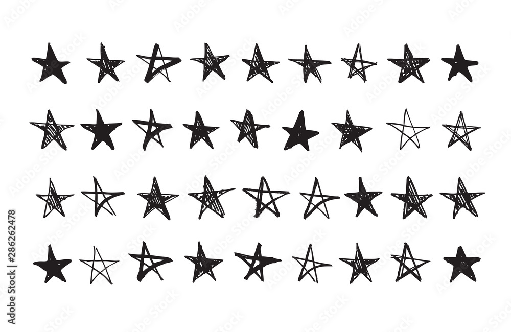 Naklejka premium Hand drawn doodle stars set