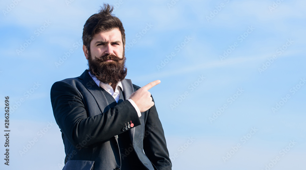 This way. Looking for opportunities and chances. Man formal suit manager looking direction. Developing business direction. Businessman bearded face sky background. Business direction. Changing course This way. Looking for opportunities and chances. Man formal suit manager looking direction. Developing business direction. Businessman bearded face sky background. Business direction. Changing course