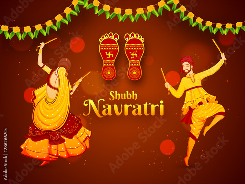 Vector illustration of man and woman dancing with dandiya stick, Goddess Laxmi footprint on shiny brown bokeh lighting background for Shubh Navratri poster or banner design.