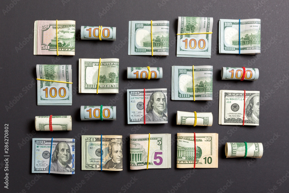 colored Background with money american hundred dollar bills on top wiev with copy space for your text in business concept colored Background with money american hundred dollar bills on top wiev with copy space for your text in business concept
