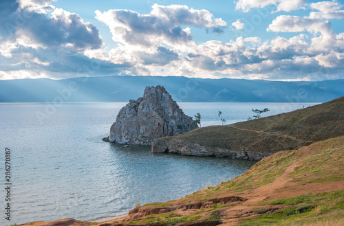 The beautiful landscape of Lake Baikal overlooking the Shamanka Rock or Cape Burkhan. One of the main attractions of the Olkhon island.