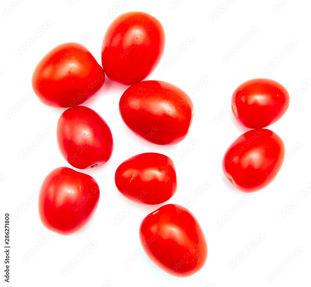 Red cherry tomatoes on a white background Red cherry tomatoes on a white background