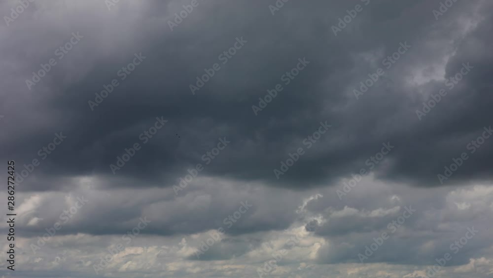 Time Lapse Beautiful rainy dark Storm clouds before thunderstorm TimeLapse in Tropical summer with scary & moody sky, dramatic Background. Time Lapse Beautiful rainy dark Storm clouds before thunderstorm TimeLapse in Tropical summer with scary & moody sky, dramatic Background.