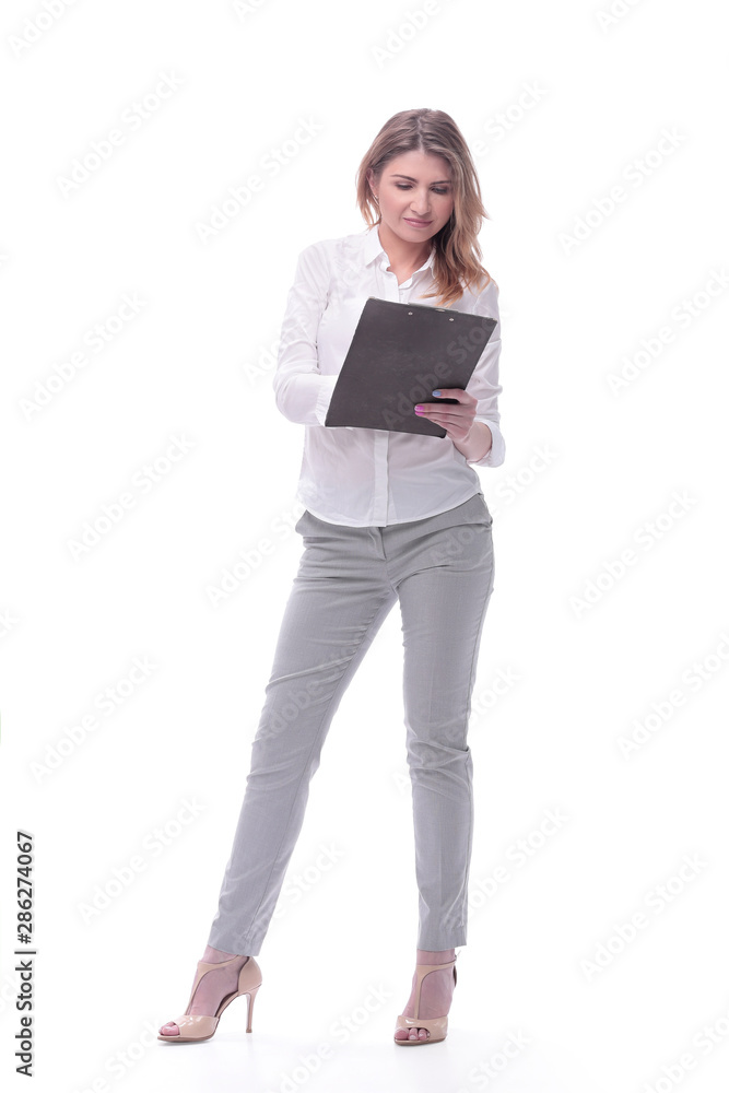 in full growth. young business woman with clipboard in full growth. young business woman with clipboard