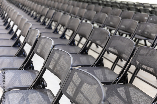 rows of empty chairs © andyross
