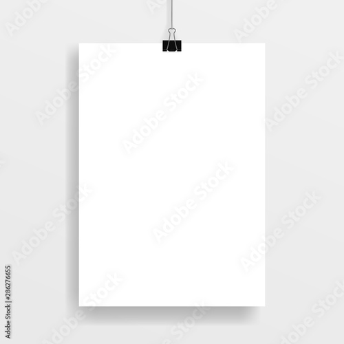 Vector image (mockup, layout) of  rectangular(A4)  poster, fastened with a black paper clip. Template, frame for your text or image. EPS 10. © Alice