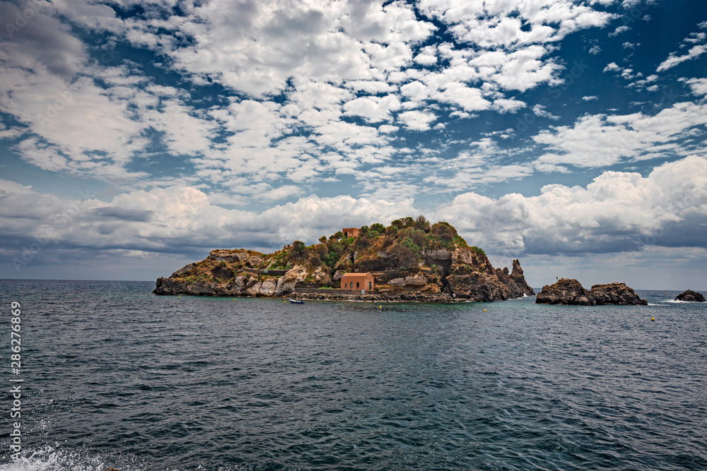 Panoramic view of the island Lachea and the Ciclopi islands in Aci Trezza in Sicily, Italy.